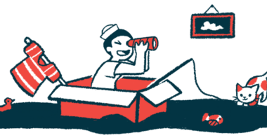 A child in a sailor hat looks through binoculars while sitting in a box with a fishing pole attached.